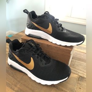 Nike Air black w gold metallic logo size 8